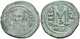 Justinian I, 527-565. Follis (Bronze, 36.5 mm, 22.65 g, 6 h), Nicomedia, 1st officina, RY 15 = 541-542. D N IVSTINI-ANVS P P AVC Diademed, helmeted an...