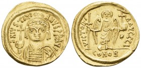 Justinian I, 527-565. Solidus (Gold, 21 mm, 4.45 g, 6 h), Carthage, indiction year Ι = 10 = 546/7. Helmeted and cuirassed bust of Justinian facing, ho...