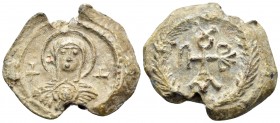 BYZANTINE SEALS. Partikios. Circa 6th Century. Seal (Lead, 25 mm, 9.94 g, 12 h). Nimbate bust of the Virgin Mary, facing, between two crosses, holding...
