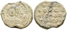 BYZANTINE SEALS. Nikephoros Episkopos of Tiberioupolis, circa 11th Century. Seal (Lead, 18.5 mm, 4.01 g, 12 h). [..]Θ TΩ C' / M/X Bust of the winged A...