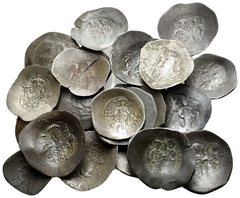 BYZANTINE. Circa 12th century. (Billon, 69.00 g). A lot of Twenty-five (25) Trac...