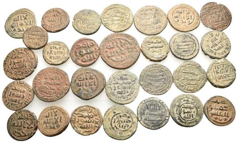 ISLAMIC. Circa 7th-8th century AD. (Bronze, 106.00 g). A fine lot of Thirty Isla...