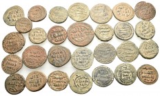 ISLAMIC. Circa 7th-8th century AD. (Bronze, 106.00 g). A fine lot of Thirty Islamic Coins, mainly Abbasid Fulus. Very fine or better. Fine patinas. Lo...
