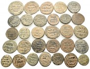 ISLAMIC. Circa 7th-8th century AD. (Bronze, 106.00 g). A fine lot of Thirty Islamic mainly Abbasid Fulus. Very fine or better. Lot sold as is, no retu...