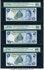 Cayman Islands Currency Board 1 Dollar 1971 (ND 1972) Pick 1a Three Consecutive Examples PMG Gem Uncirculated 65 EPQ; Gem Uncirculated 66 EPQ (2). 

H...