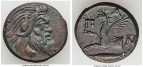 CIMMERIAN BOSPORUS. Panticapaeum. 4th century BC. AE (20mm, 6.71 gm, 12h). XF. Head of bearded Pan right / Π-A-N, forepart of griffin left, sturgeon l...