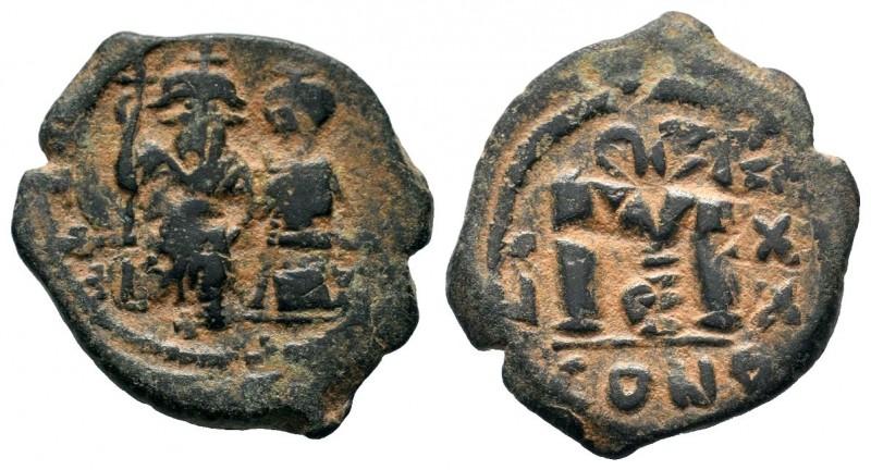 Arab - Byzantine Coins Ae,
Condition: Very Fine

Weight: 5,46 gr
Diameter: 22,75...