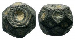 Byzantine bronze barrel weight with ring and dot motifs,About fine to about very fine.
Weight: 14,57 gr
Diameter: 12,30 mm