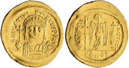 Justinian I, 527-565. Solidus (Gold, 20 mm, 4.51 g, 7 h), Constantinopolis, 545-565. D N IVSTINIANVS P P AVI Helmeted and cuirassed bust of Justinian ...