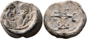 Uncertain, 6th-7th century. Seal (Lead, 19 mm, 12.86 g, 1 h). Confronted busts of Saints Peter and Paul; above, small cross. Rev. Cruciform monogram c...