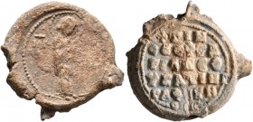 Uncertain, 11th century. Seal (Lead, 22 mm, 8.71 g, 5 h). MHP - ΘV The Theotokos “Hagiosoritissa” standing to the right, nimbate, both hands raised in...