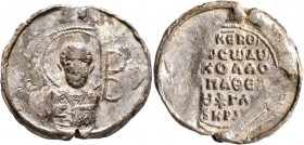 Nikolaos, protospatharios epi tou Chrysoklinou and judge, 11th century. Seal (Lead, 30 mm, 11.68 g, 12 h). Nimbate facing bust of Saint Nicholas, rais...