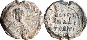 Georgios, protospatharios and strategos, 11th century. Seal (Lead, 27 mm, 13.22 g, 12 h). [KЄ RΘ] - Tω Cω Δ,; in fields, Θ / Γ-O/P/ΓI/O Nimbate facing...