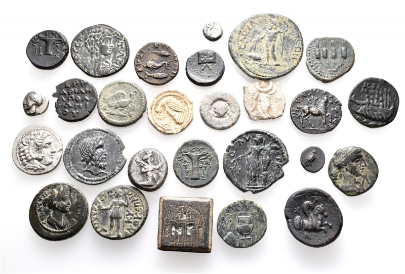 A lot containing 4 silver, 19 bronze coins, 1 bronze weight and 3 lead tesserae....