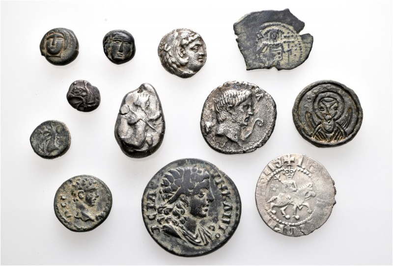 A lot containing 5 silver, 6 bronze coins and 1 bronze amulet. Includes: Greek, ...