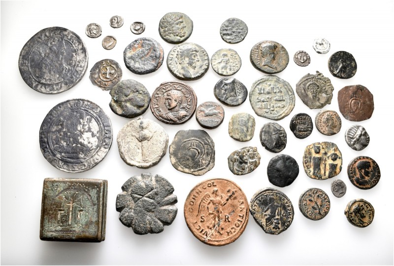 A lot containing 10 silver, 27 bronze coins 1 lead tessera, 2 bronze weights and...