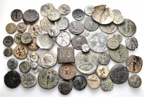 A lot containing 1 electrum (broken), 11 silver, 45 bronze coins, 1 lead seal and 1 bronze weight with silver inlays. Includes: Greek, Roman Provincia...