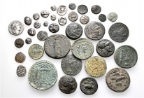 A lot containing 15 silver and 23 bronze coins. Includes: Greek, Roman Provincial and Islamic. Fine to very fine. LOT SOLD AS IS, NO RETURNS. 38 coins...