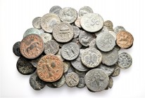 A lot containing 90 bronze coins. All: Roman Provincial. Fine to very fine. LOT SOLD AS IS, NO RETURNS. 90 coins in lot.