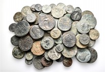 A lot containing 90 bronze coins. All: Roman Provincial. Fine to very fine. LOT SOLD AS IS, NO RETURNS. 90 coins in lot.