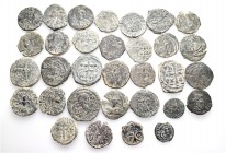 A lot containing 32 bronze coins. Includes: Byzantine, Crusaders, early Medieval. Fine to very fine. LOT SOLD AS IS, NO RETURNS. 32 coins in lot.