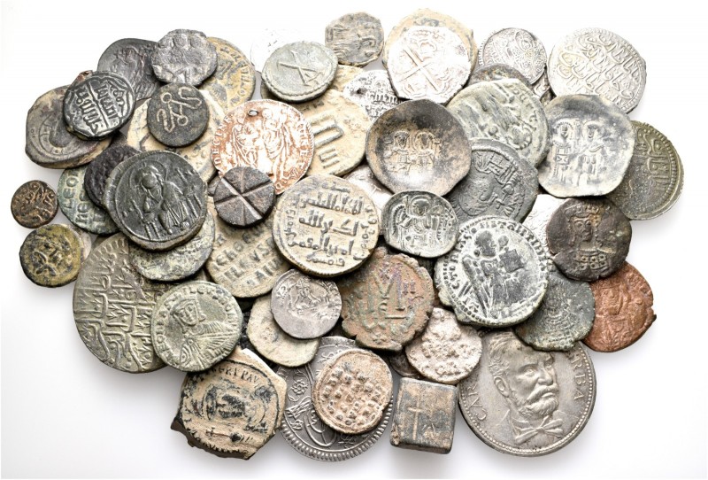 A lot containing 31 silver, 51 bronze coins, 3 lead seals and 3 bronze weights. ...