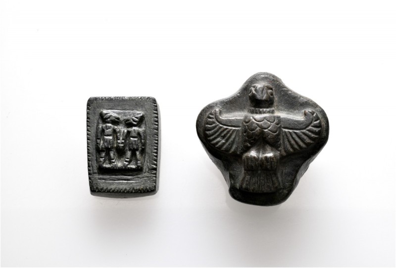 A lot containing 2 bronze weights. All: Phoenician (?). Two figures: 18x24 mm an...