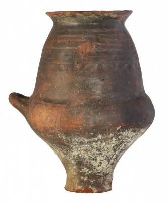 A Villanovan biconical cinerary urn
Etruria, 9th – 8th century BC; alt. cm 39; ...