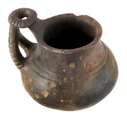 A charming clay jug
Etruria, 9th – 8th century BC; alt. cm 9; A jug in brown cl...