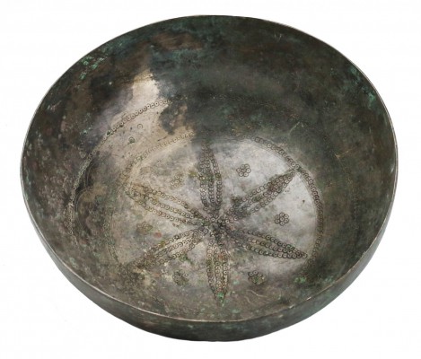A silver-plated bronze Islamic dish
Ummayad Dynasty, ca. 7th - 8th century AD; ...