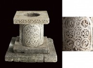 A splendid puteal in aurisina stone
Italy, 11th century; alt. cm 82; A circular puteal with four finely decorated sections carved with plant motifs, ...