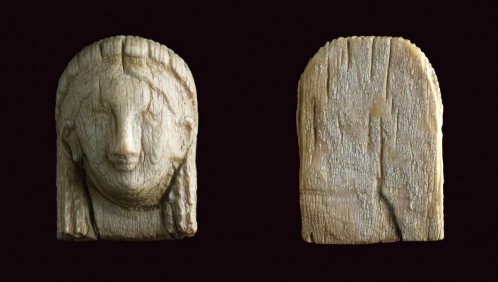 Small Ivory plaque in shape of Kore head
Greek production, 7th – 6th century BC...