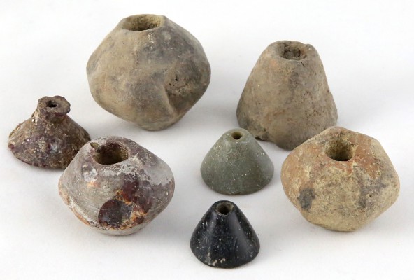A collection of spindle whorls
Iron Age; alt. max mm 34; Group of seven spindle...