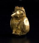 A Pre-Columbian bird figure
Colombia, Tairona Culture, AD 1000 – 1500; alt. cm 4; Bird-shaped figure made in tumbaga (gold and copper alloy) and used...