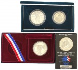 Lote 4 monedas 1/2 y 1 Dólar (3). 1983-S y 1992. CuNi, AR (3). Olimpiadas Los Angeles ´83 (2) y V centenario Cristóbal Colón. En presentaciones origin...