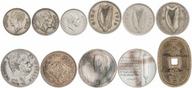 Lote 11 monedas. 1879 a 1990. IRLANDA (3), ISRAEL (2), IRAQ (3), ITALIA, JAPÓN (2). AR (10), CuNi (1). 1/2 Corona (2), 1 libra, 10 (Aniversario Indepe...