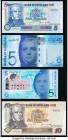 Scotland Bank of Scotland Group Lot of 8 Examples About Uncirculated-Uncirculated. The 1998 Ten Pound example grades About Uncirculated due to a small...