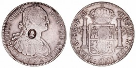 Carlos IV
8 Reales. AR. Méjico FM. 1792. Resello oval con el busto de Jorge III para circular como 4 chelines y 9 peniques. 26.87g. De Mey 659. Rara....