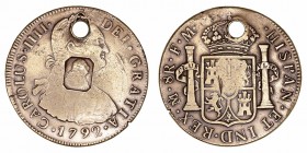 Carlos IV
8 Reales. Latón. Méjico FM. 1792. Falsa de época. Con resello octogonal de Jorge III y agujero. 23.76g. Rara. MBC-.