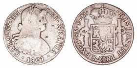 Carlos IV
8 Reales. AR. Méjico FM. 1801. Agujero tapado y resellos chinos. 26.33g. Cal.696. (BC-).