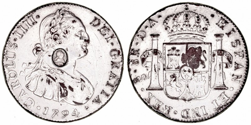 Carlos IV
8 Reales. AE. Santiago DA. 1794. Falsa de época. Resello oval de Jorg...