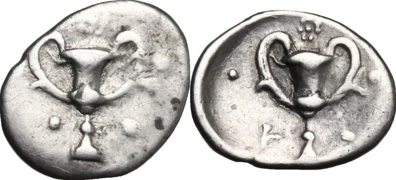 Greek Italy. Southern Apulia, Tarentum. AR Obol, c. 280-228 BC. D/ Kantharos; fi...