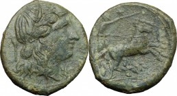 Sicily. Syracuse. Fourth democracy (c. 289-287 BC). AE 22 mm. D/ Head of Kore right, wearing wreath of reed; torch behind. R/ Nike in biga right; abov...