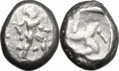 Greek Asia. Pamphylia, Aspendos. AR Stater, c. 465-430 BC. D/ Warrior advancing right, holding shield and sword; ivy leaves flanking and between legs....