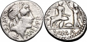 L. Caecilius Metellus and C. Publicius Malleolus. AR Denarius, 96 BC. D/ Head of Apollo right, laureate. R/ Roma seated left on pile of shields, holdi...