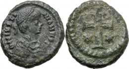 Justinian I (527-565). AE Decanummium. Ravenna mint. Ravenna mint. Struck 540-547. D/ Diademed, draped, and cuirased bust right. R/ Cross with star in...