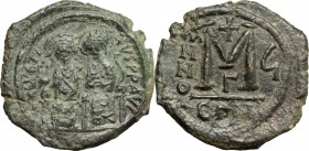 Justin II, with Sophia (565-578). AE Follis. Constantinople mint, 3rd officina. Dated RY 6 (570/1). D/ Nimbate figures of Justin and Sophia seated fac...