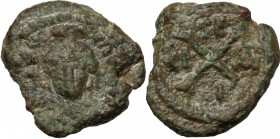 Maurice Tiberius (582-602). AE Decanummium. Syracuse mint. Struck 588-602. D/ Helmeted, draped, and cuirassed bust facing, holding long cross. R/ Larg...