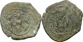 Heraclius (610-641), with Martina and Heraclius Constantine. AE Follis. Constantinople mint, struck 624-629. D/ Heraclius, in center, flanked by Marti...