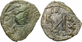 Constantine IV (668-685). AE Follis, Ravenna mint. D/ Helmeted and cuirassed bust facing slightly right, holding spear over shoulder and shield on arm...